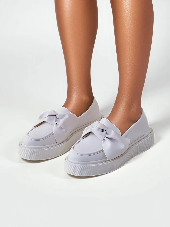 Royalfashion Elegant women's moccasins with a bow Ortto