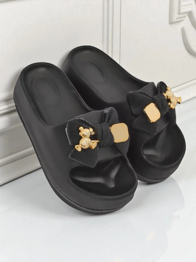Royalfashion Women's rubber flip-flops with a decorative bow Alday