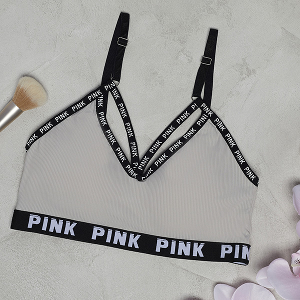 Sieviešu pelēks sporta krūšturis ar uzrakstiem - Apakšveļa