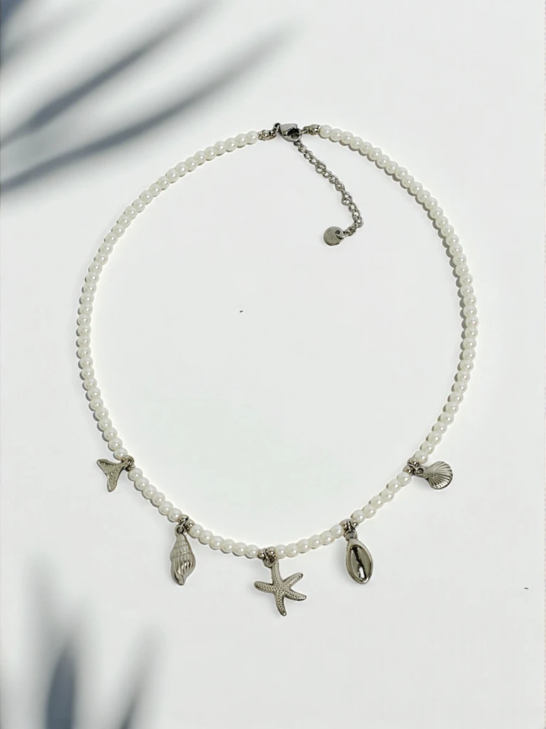 Collana Thalassa – Pearl necklace with Mediterranean-style pendants