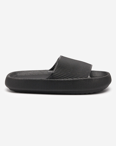 Black rubber slippers with Torika embossing - Footwear