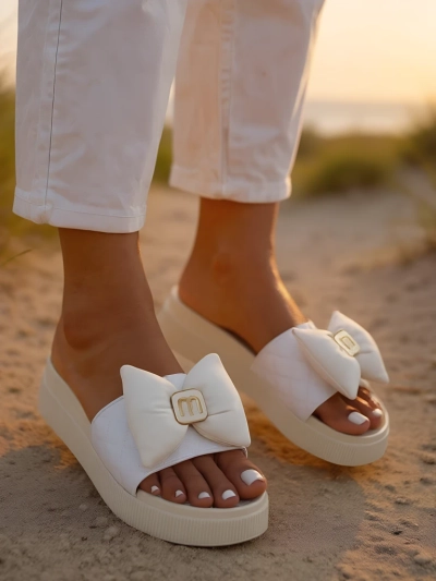 Royalfashion Women's platform flip-flops with a bow Mivo Jump