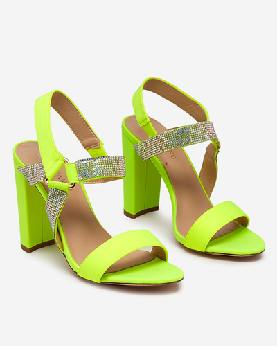 Neon yellow women's sandals on the Xiobi post. Footwear
