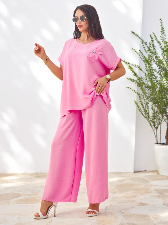 Royalfashion Женский комплект с коротким рукавом с декоративным цветком и широкими брюками