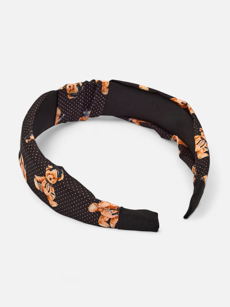 Royalfashion Hårband med flätat mönster i prickar och nallar