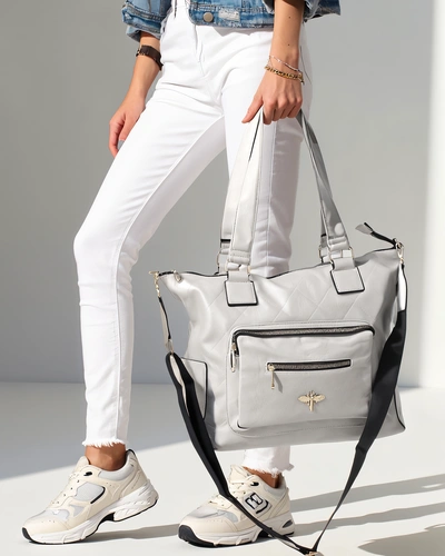 Royalfashion Women's handbag made of eco-leather with a pocket on the front