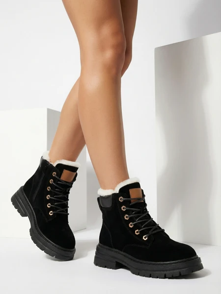 Royalfashion Women's insulated trapper boots in black Radoras