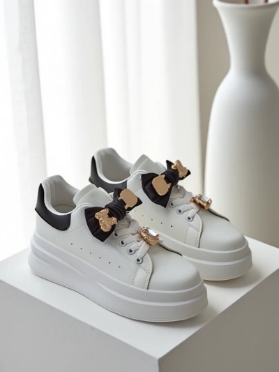 Royalfashion Women's platform sneakers with a bow Genimma