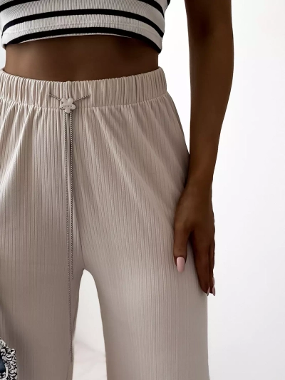 Beige women's wide ribbed pants - Clothing