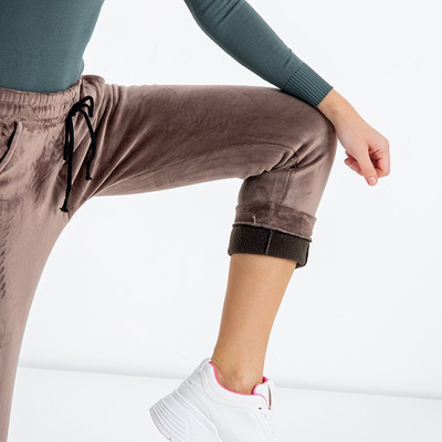 Brown women's insulated sweatpants with white stripes - Clothing