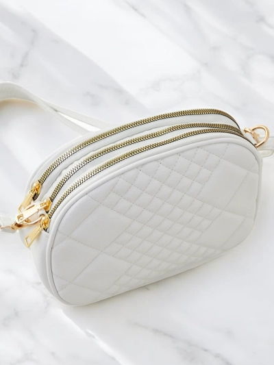 Royalfashion Small oval women's handbag made of eco-leather