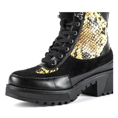 Black snakeskin imitation bags on a pole - Footwear