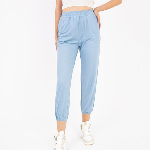 Women's light blue fabric trousers - Clothing