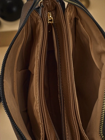 Liten dameveske i miljøvennlig skinn Tessaria