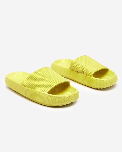 Green rubber slippers with Torika embossing - Footwear