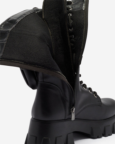 Melni darba zābaki ar dekoratīvām paciņām Reggo-Shoes virspusē