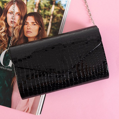 Black women's clutch bag on a chain with embossing - Handbags