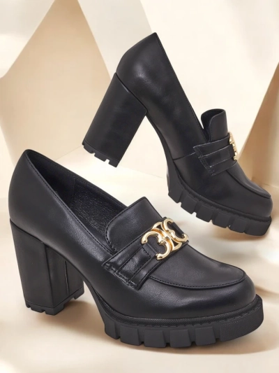 Women's Nero Aurora block heel pumps with a gold buckle, eco leather