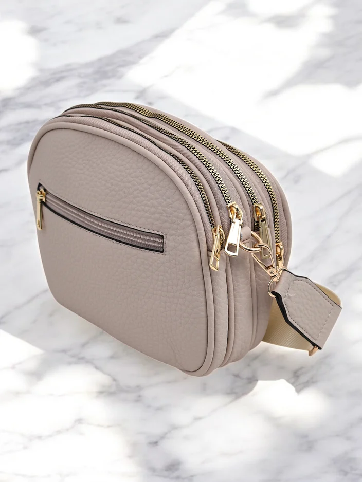 Royalfashion Oval small women's handbag made of eco leather