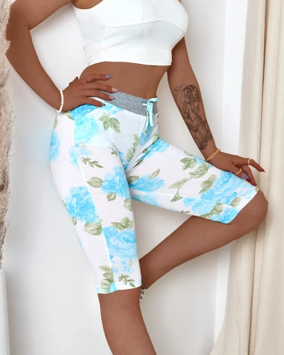 Women's white 3/4 length shorts with blue flowers - Clothing