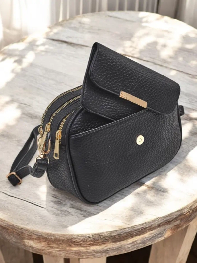 Royalfashion Small women's handbag made of eco-leather