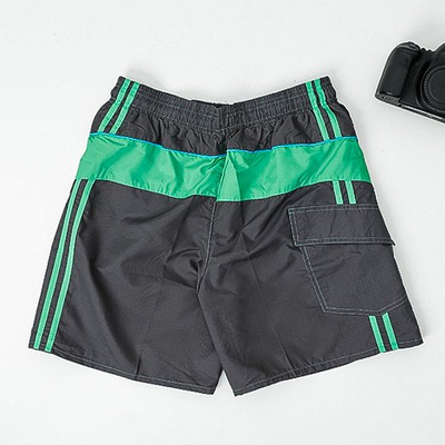 Men's black sports shorts with green inserts - Clothing