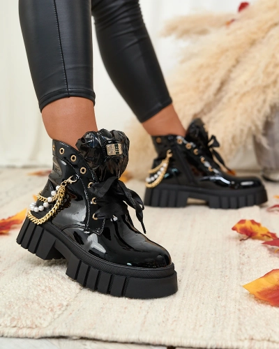 Royalfashion Women's lacquered insulated boots in black Dahaff