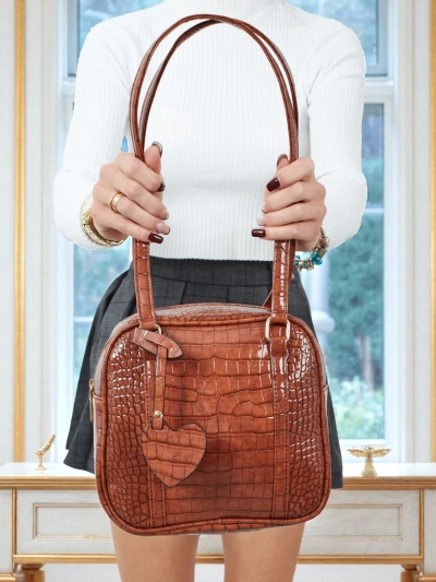 Лакированная маленькая женская сумка из экокожи Velinne