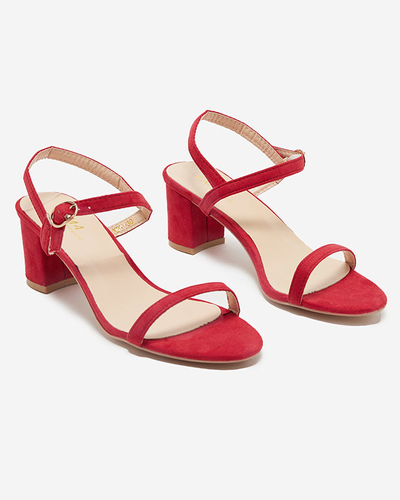 Red Usopi women's sandals on a post - Footwear