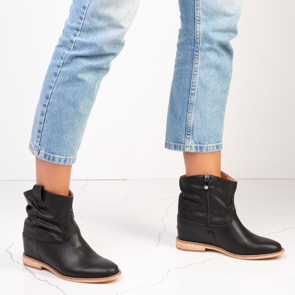 Black cowboy boots on a daress's wedge heel - Footwear 1