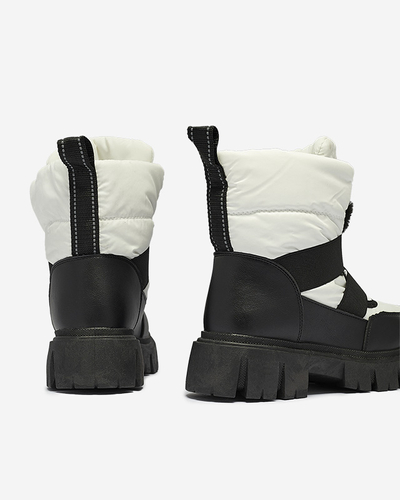 Sieviešu sniega zābaki ar plakanu zoli melnā un baltā krāsā Ferory- Footwear