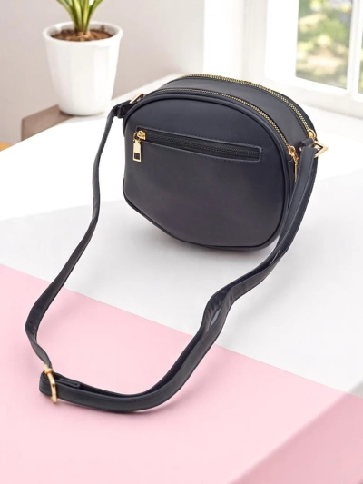 Royalfashion Small round women's handbag made of eco leather Riva Circle