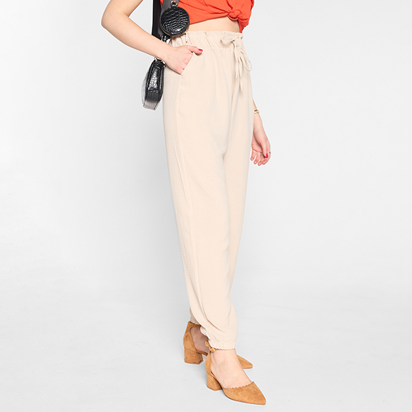 Women's fabric trousers in beige color PLUS SIZE - Clothing