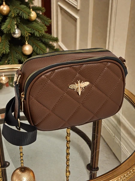 Quiltet liten dameveske i imitert skinn Connere