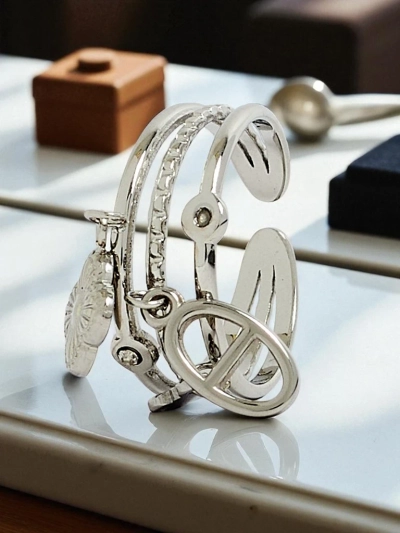 Dolce Vita bangle bracelet with decorative charms