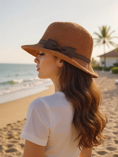 Royalfashion Women's hat decorated with a bow Summer Grace