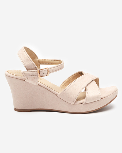 OUTLET Beige women's sandals on a Deklis post - Footwear