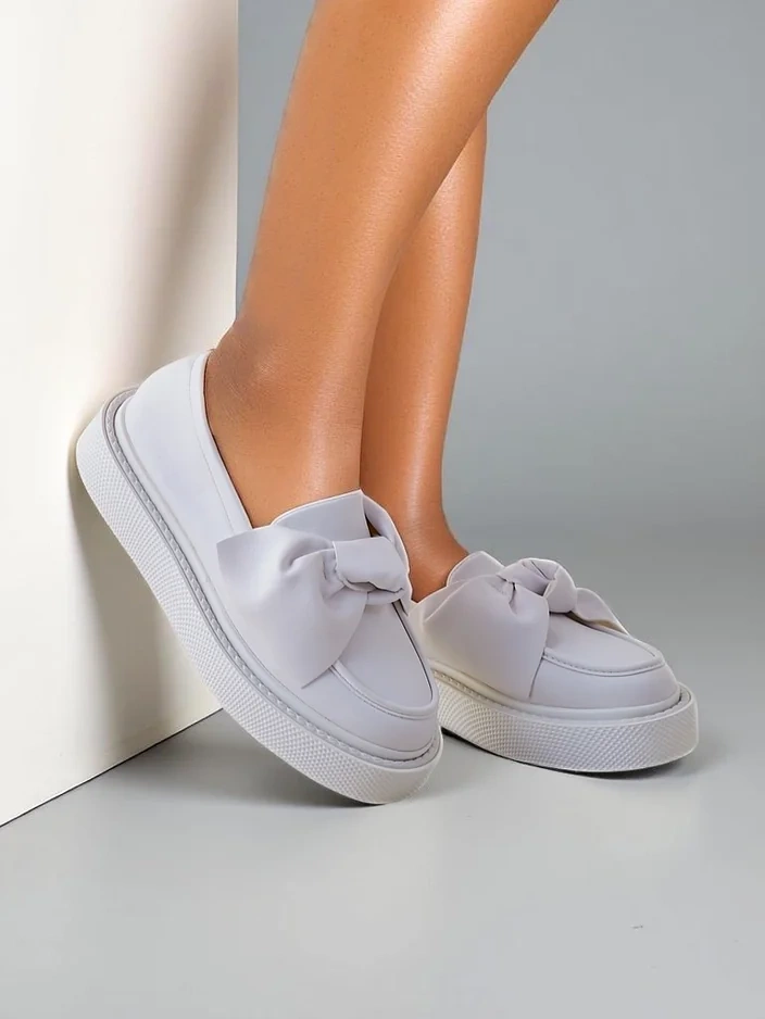 Royalfashion Elegant women's moccasins with a bow Ortto