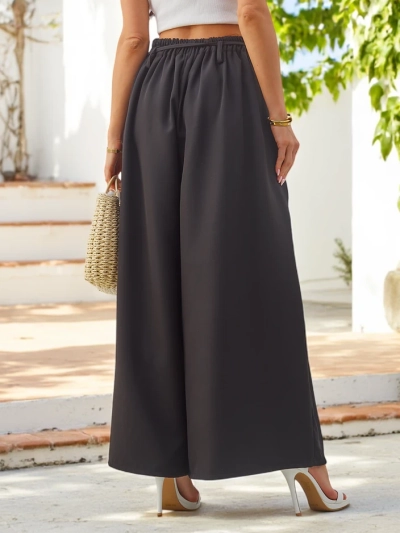 Royalfashion Elegant wide women’s trousers with a decorative flower at the belt