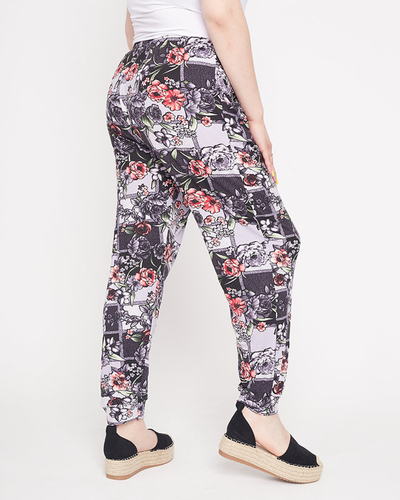 Patterned black and purple women's pants - Clothing