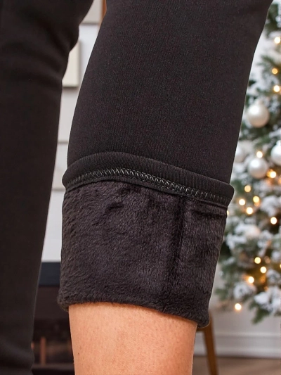 Royalfashion Sieviešu siltinātas tegingi bikses PLUS SIZE