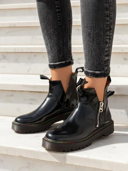Black lacquered women's boots with a Odeta zipper - Footwear