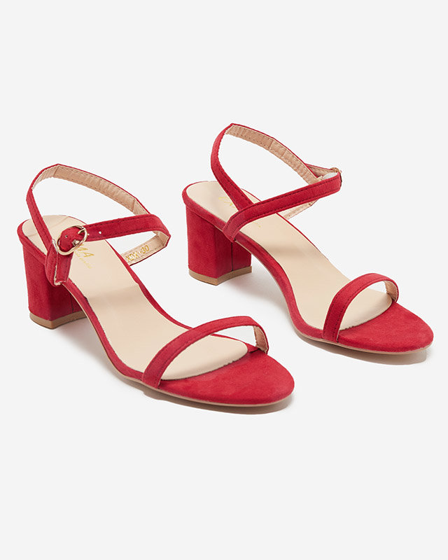 Red Usopi women's sandals on a post - Footwear
