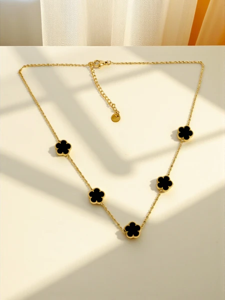 Persefone Aurea Necklace with Black Flowers on a Gold-Plated Chain