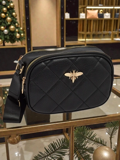 Quiltet liten dameveske i imitert skinn Connere