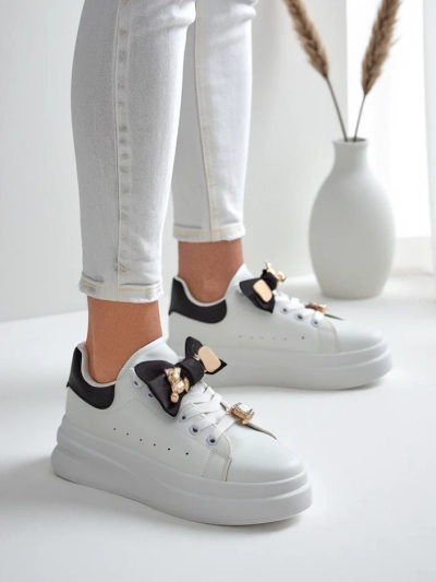Royalfashion Women's platform sneakers with a bow Genimma