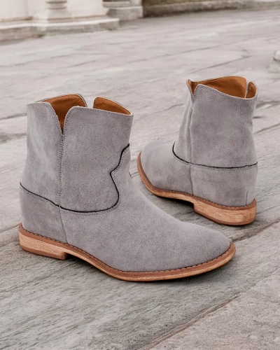 Royalfashion Kowboy-style ankle boots on a covered wedge Bluestone