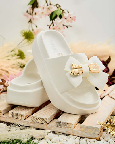 Royalfashion Women's rubber flip-flops with decorative bow Apis