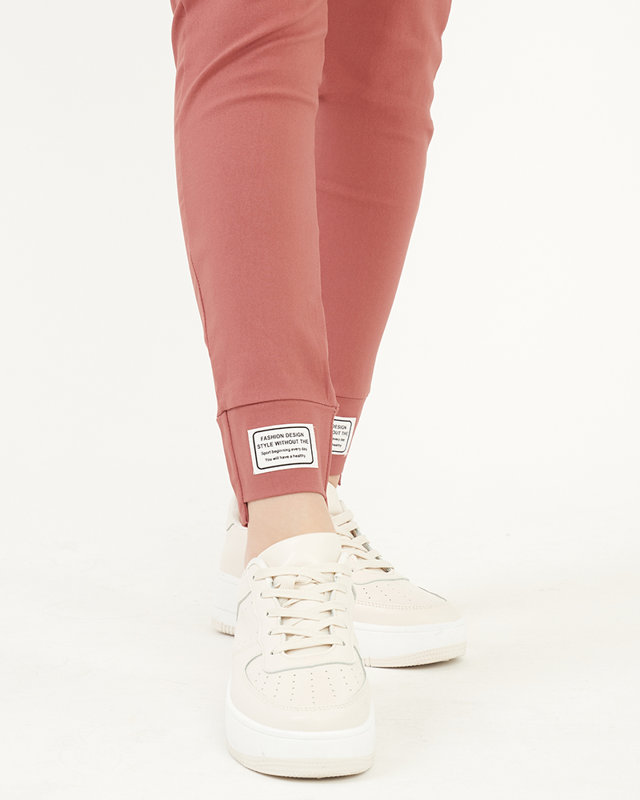 Women's coral fabric trousers with patches - Clothing