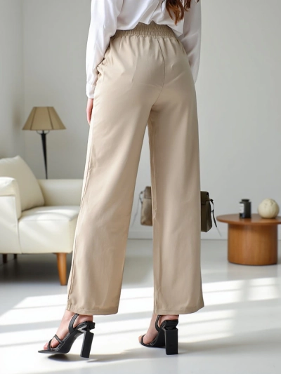 Royalfashion Wide women's trousers with a decorative buckle